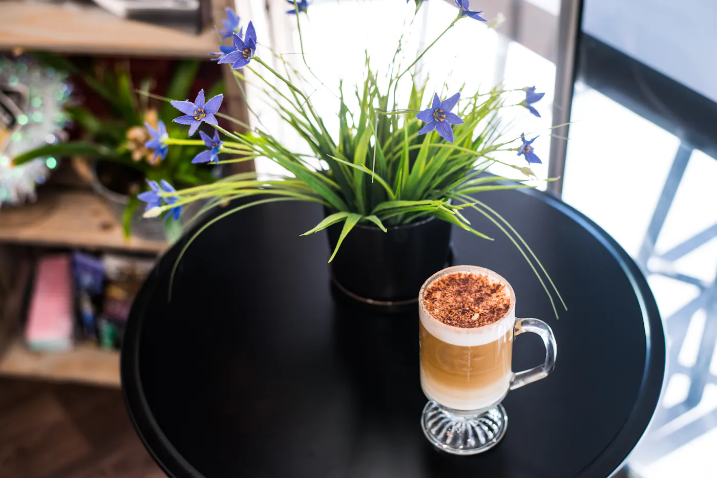A welcoming coffee and floral detail inside the salon